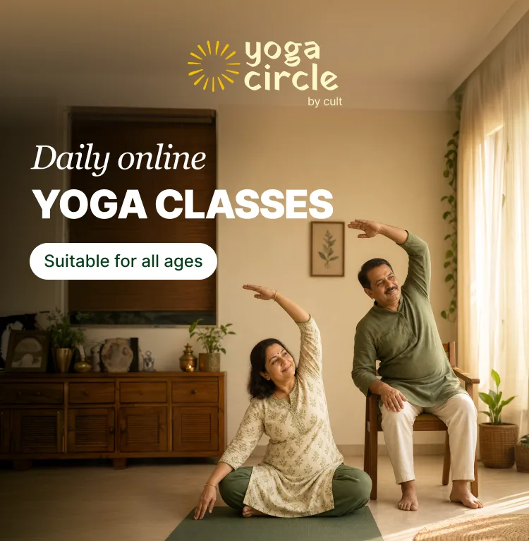 Two adults practicing yoga at home